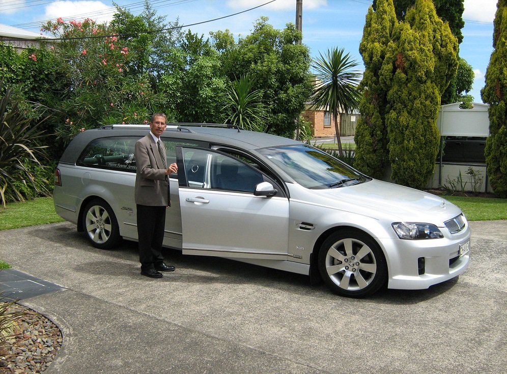 Bryce with the flagship Holden Heritage Hearse